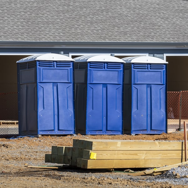 what is the cost difference between standard and deluxe porta potty rentals in Hensley AR